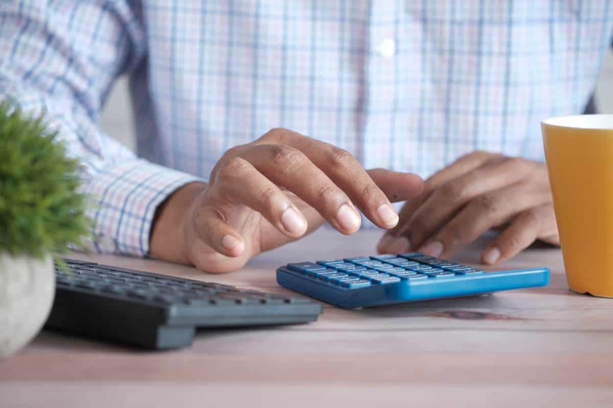 person-using-calculator